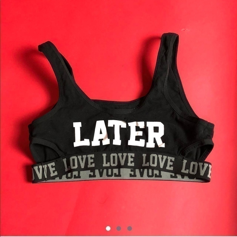 Black sports bra with cut outs and the graphic “later”🤍🖤